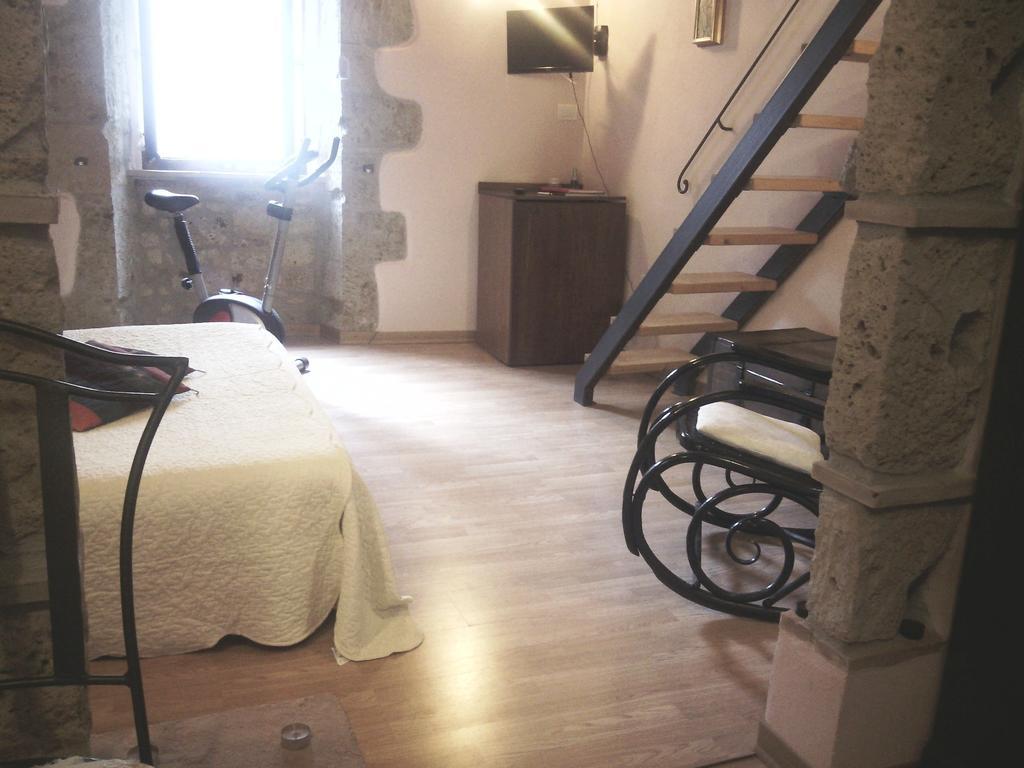 4 Assi Apartamento Pitigliano Quarto foto
